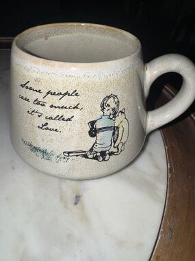 Modern Gourmet Foods Stoneware Mug — Winnie the Pooh theme Cream with Tan Rim